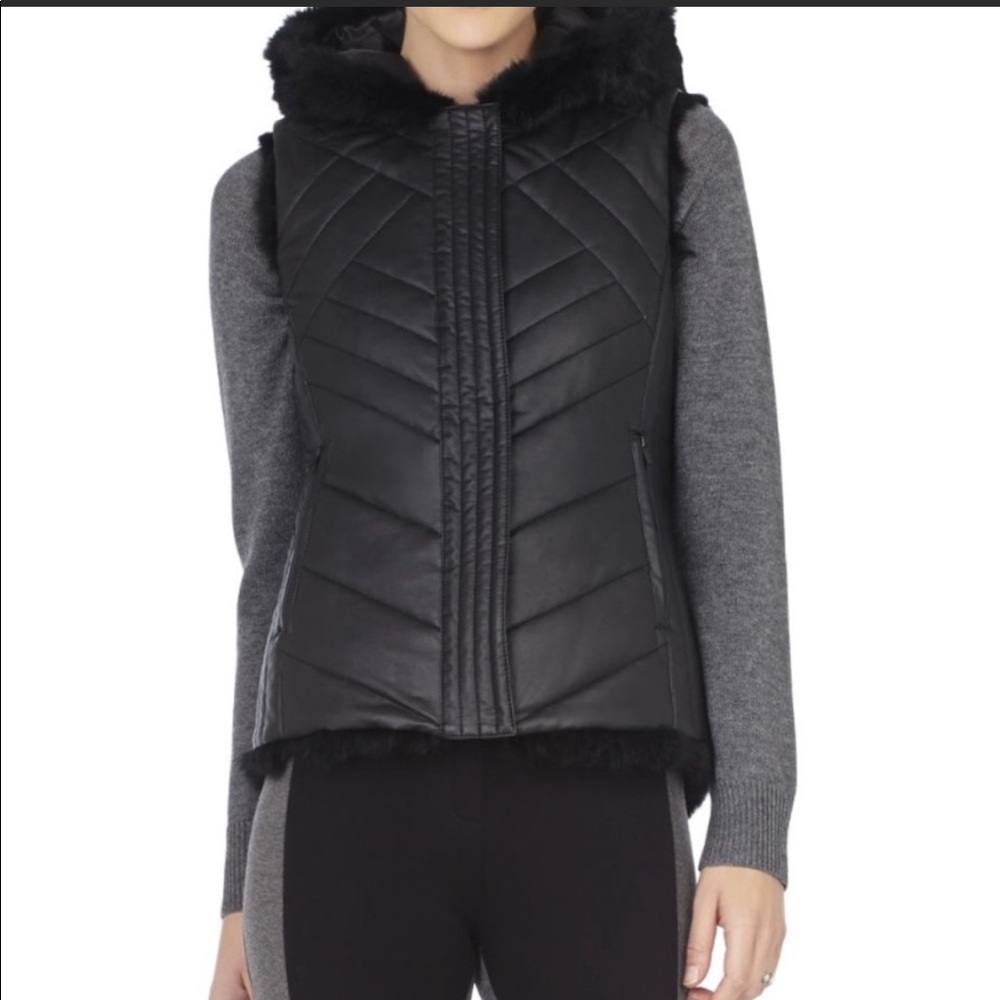 Reversible fur and faux leather hooded vest